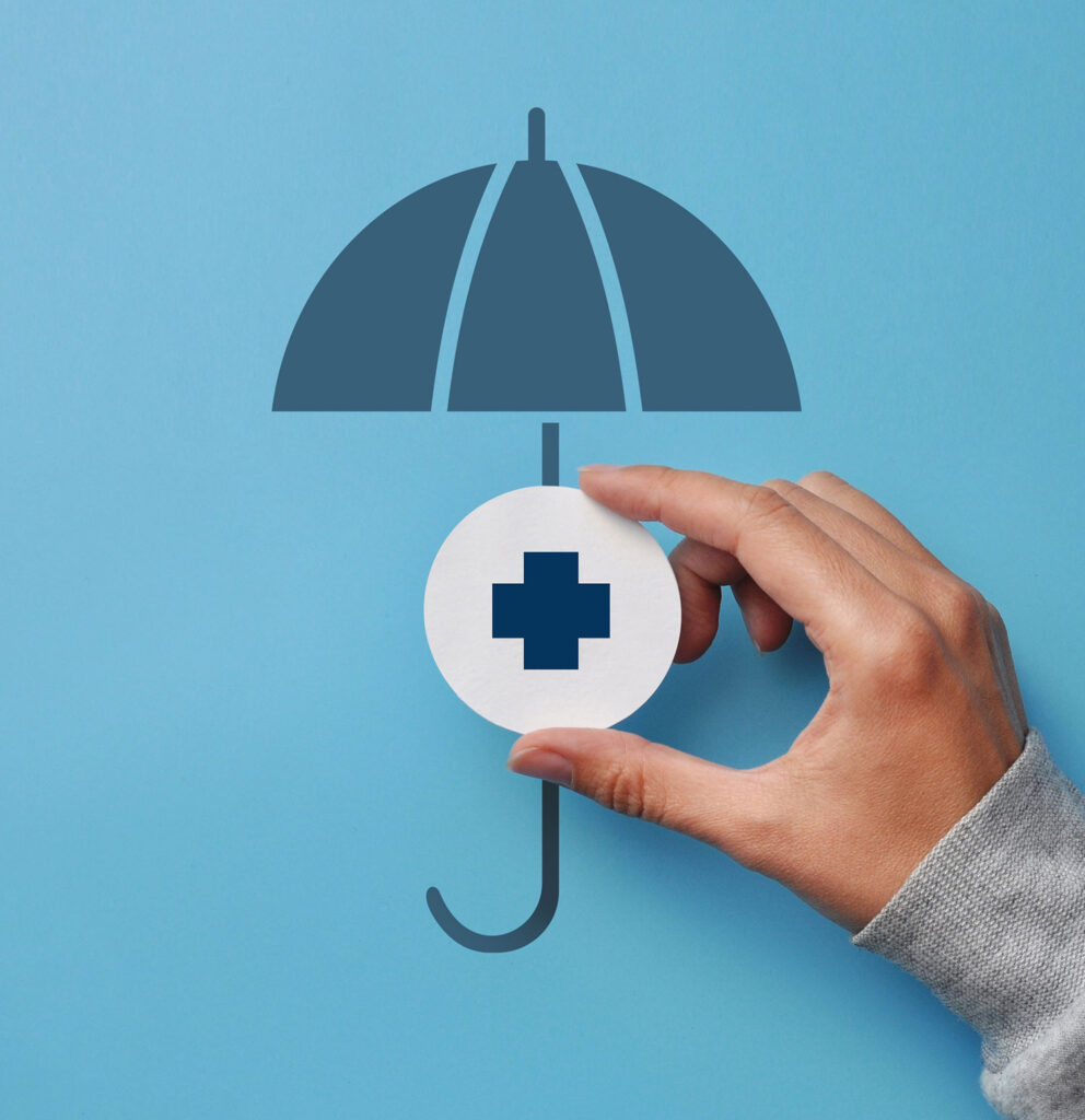 Betriebliche-Krankenversicherung Symbolbild für Betriebliche-Krankenversicherung: Regenschirm mit einem Kreuz-Icon